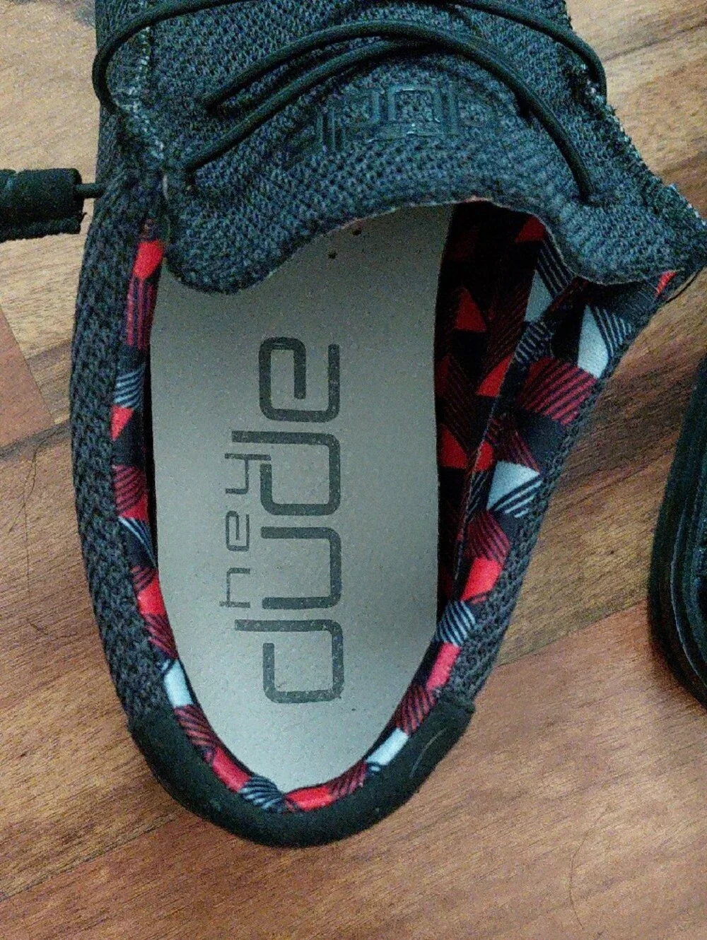 Hey Dude Wally Sox Jet Black Men’s Black Slip-On Shoes Red White Accent Sz 10